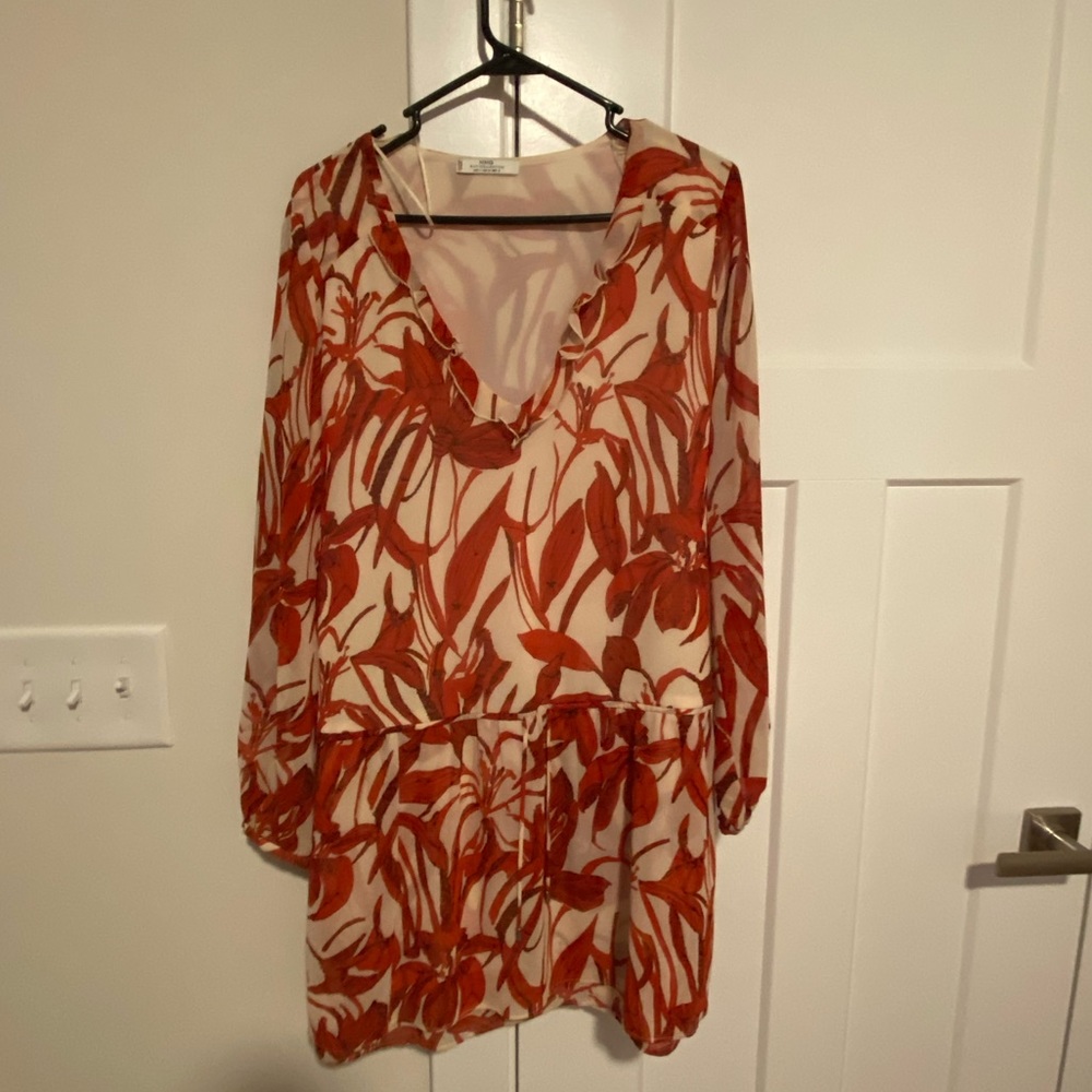 MNG Suit Collection White and red floral print dress. Low V Neck. Long sleeves